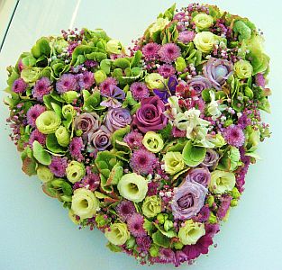 Valentines heart shape arrangement made of hortensia, roses, santini, eustoma, alstroemeria, etc.